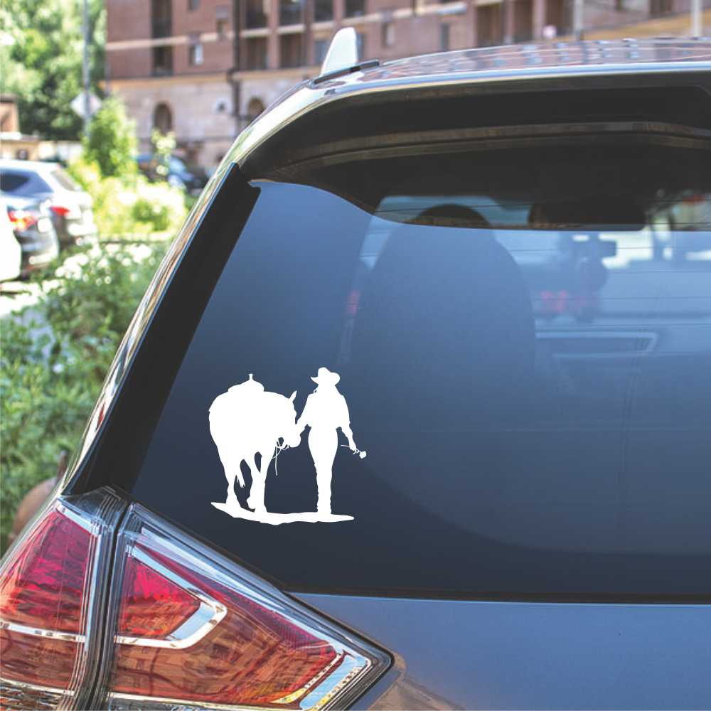 cowgirl walking her horse holding a rose vinyl decal sticker